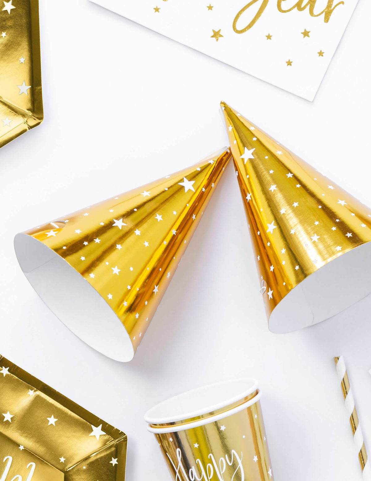 Chapeaux de fête étoiles blanches pour anniversaire dorés