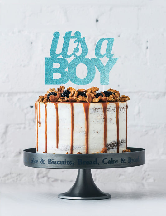 Mise en situation sur un gâteau du cake topper it's a boy pour baby shower