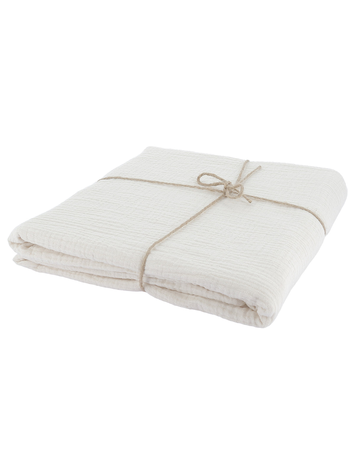 Vue de profil de la nappe pliée avec ficelle de la nappe en gaze de coton style bohème crème