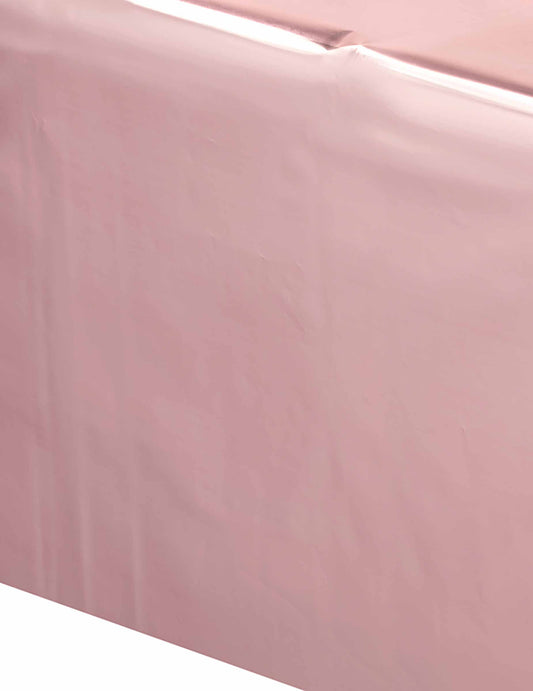 Gros plan sur la matière de la nappe en plastique rose gold pour fête