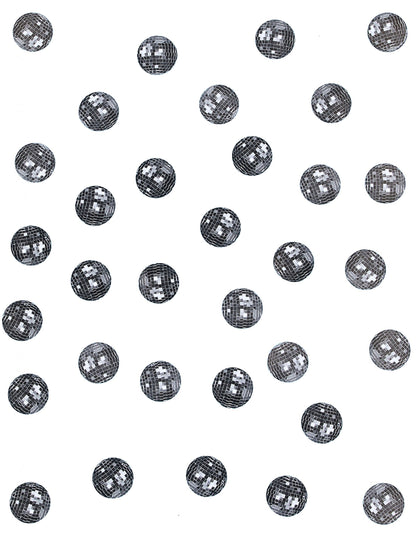 Détail des motifs des confettis de table boule disco