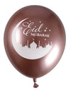 Mise en situation sur une table de fête des ballons en latex Eid Mubarak