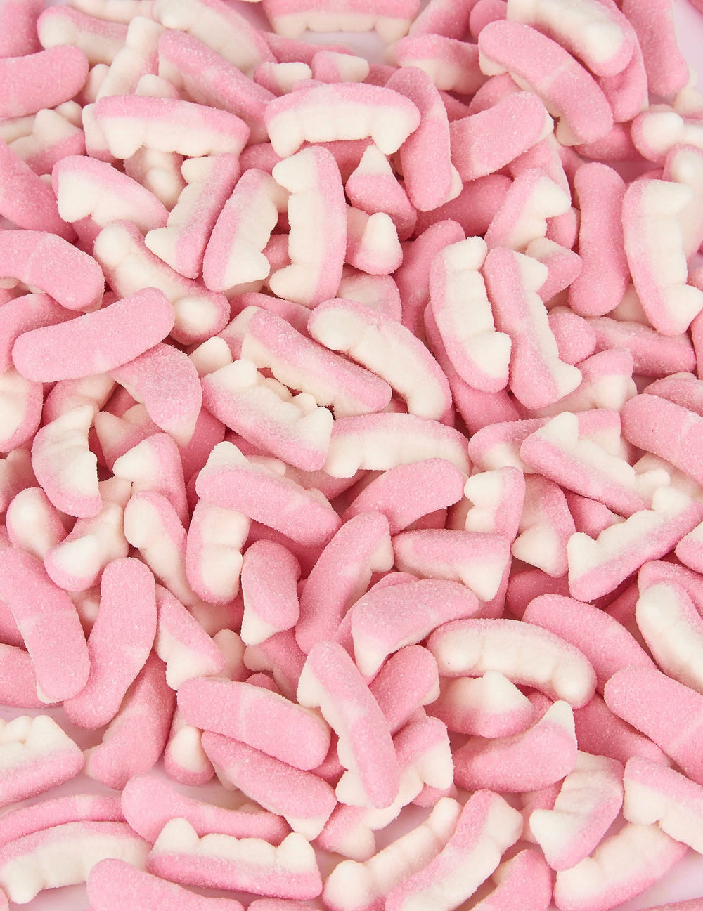 Bonbons dents de vampire Haribo pour Halloween roses et blancs