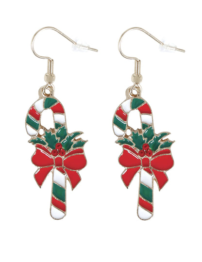 Gros plan des boucles d'oreilles métalliques canne à sucre de Noël