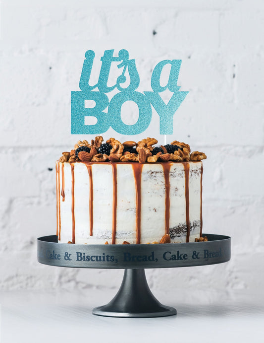 Mise en situation sur un gâteau du cake topper it's a boy pour baby shower