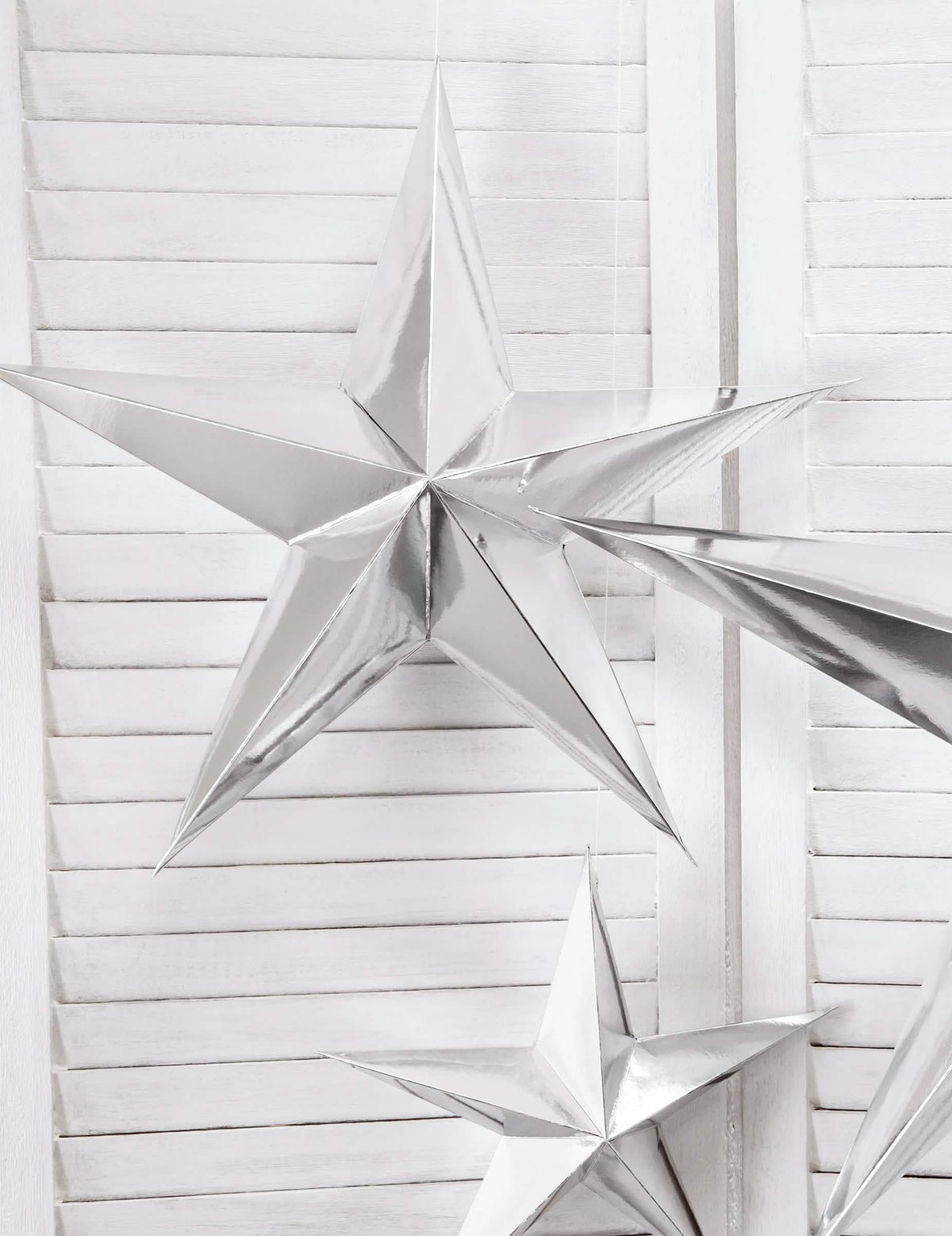 Mise en scène de la décoration à suspendre étoile pour Noël
