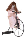 Décoration animée fillette possédée sur vélo pour Halloween robe rose avec mouvement