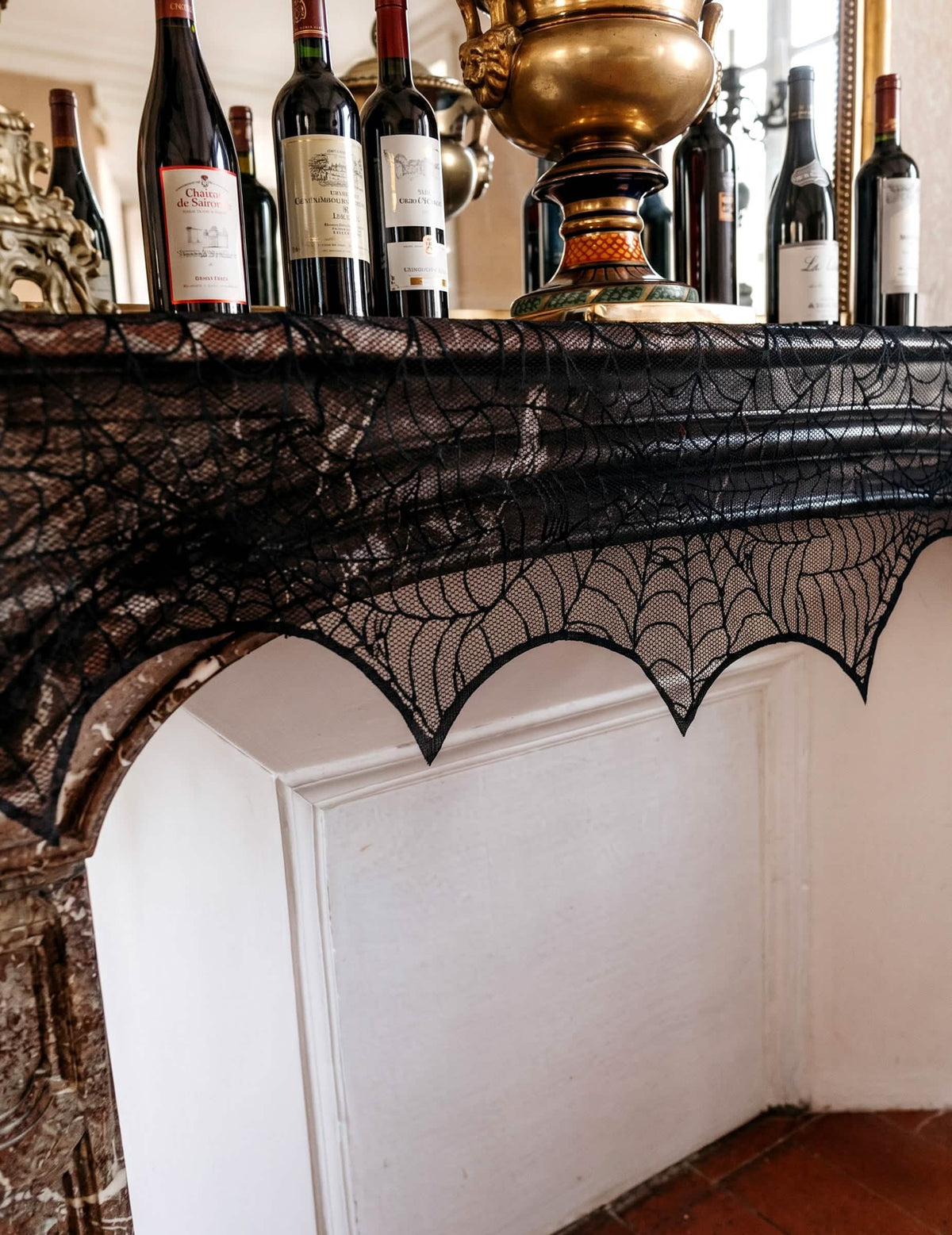 Décoration toile d'araignée en dentelle noire 43 cm x 2,50 m