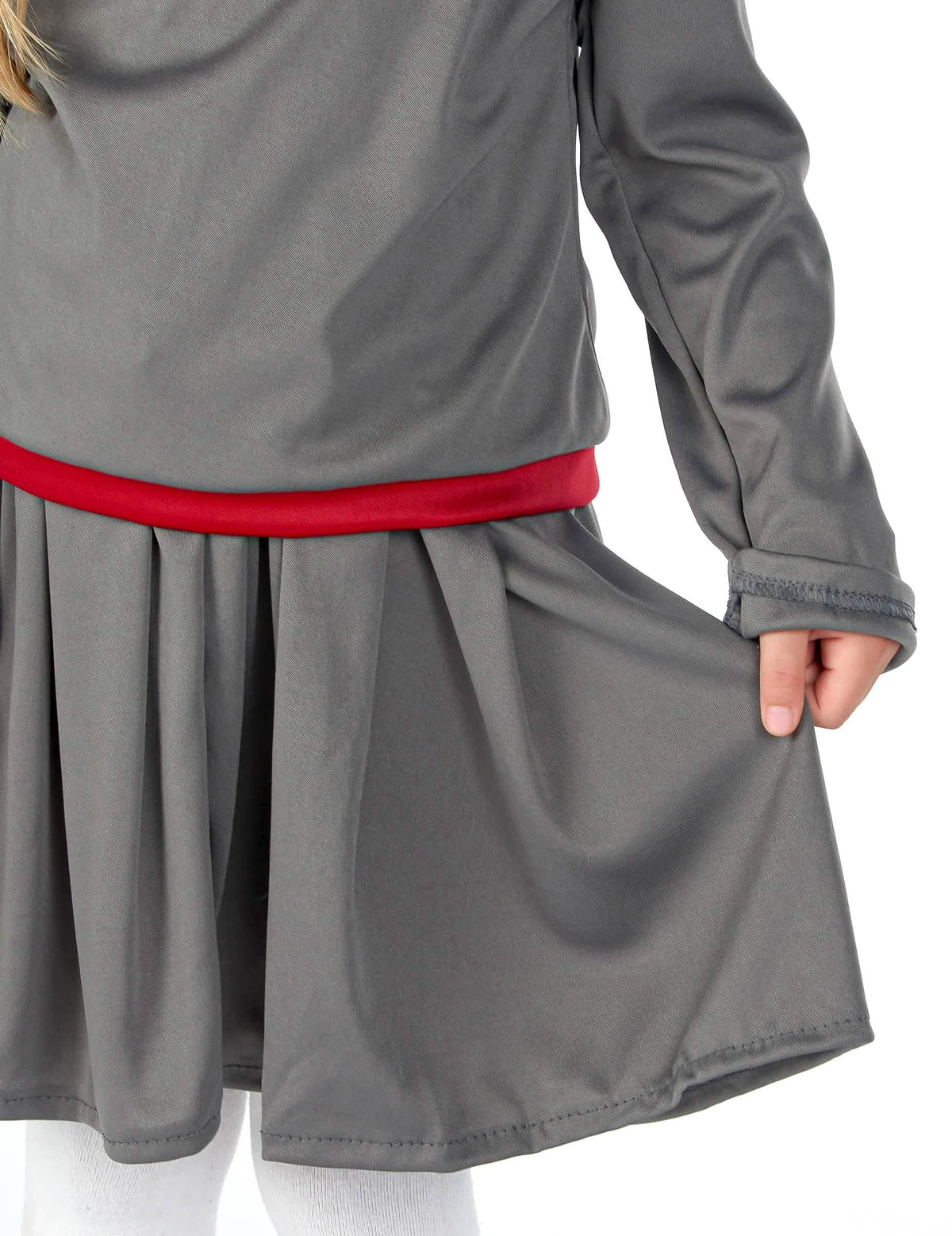 Détail de la jupe plissée et de la ceinture rouge du déguisement d'apprentie sorcière pour fille