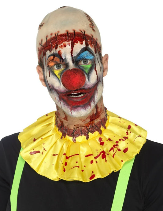 Gros plan sur le maquillage du kit en latex de clown effrayant Halloween pour adulte