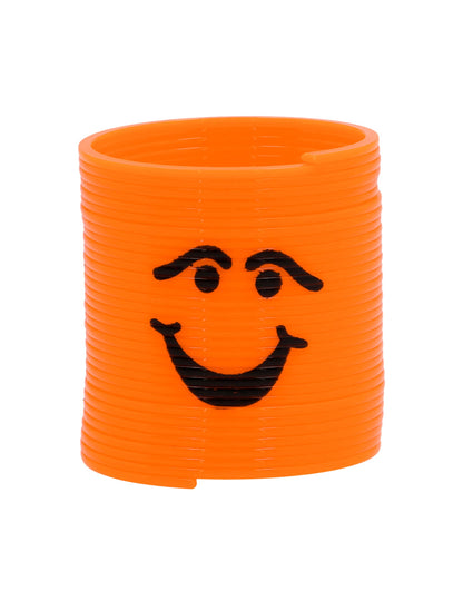 Gros plan sur le modèle orange du lot de mini ressorts visages amusants pour pinata