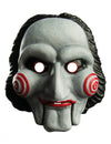 Masque en plastique Saw pour adulte blanc avec spirales rouges et cheveux noirs