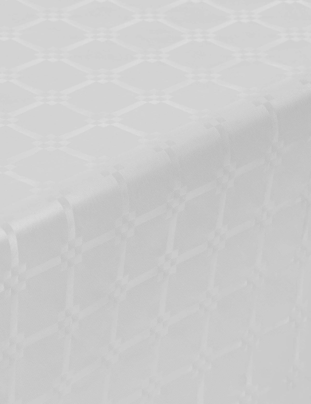 Détail du motif damassé de la nappe en rouleau papier damassé blanche