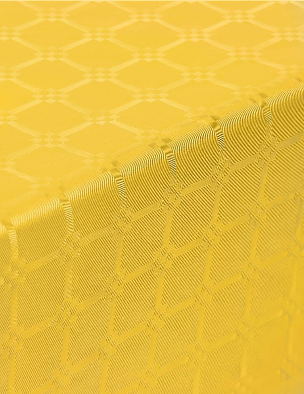 Close-up van het motief van het gele damasten papieren roltafelkleed