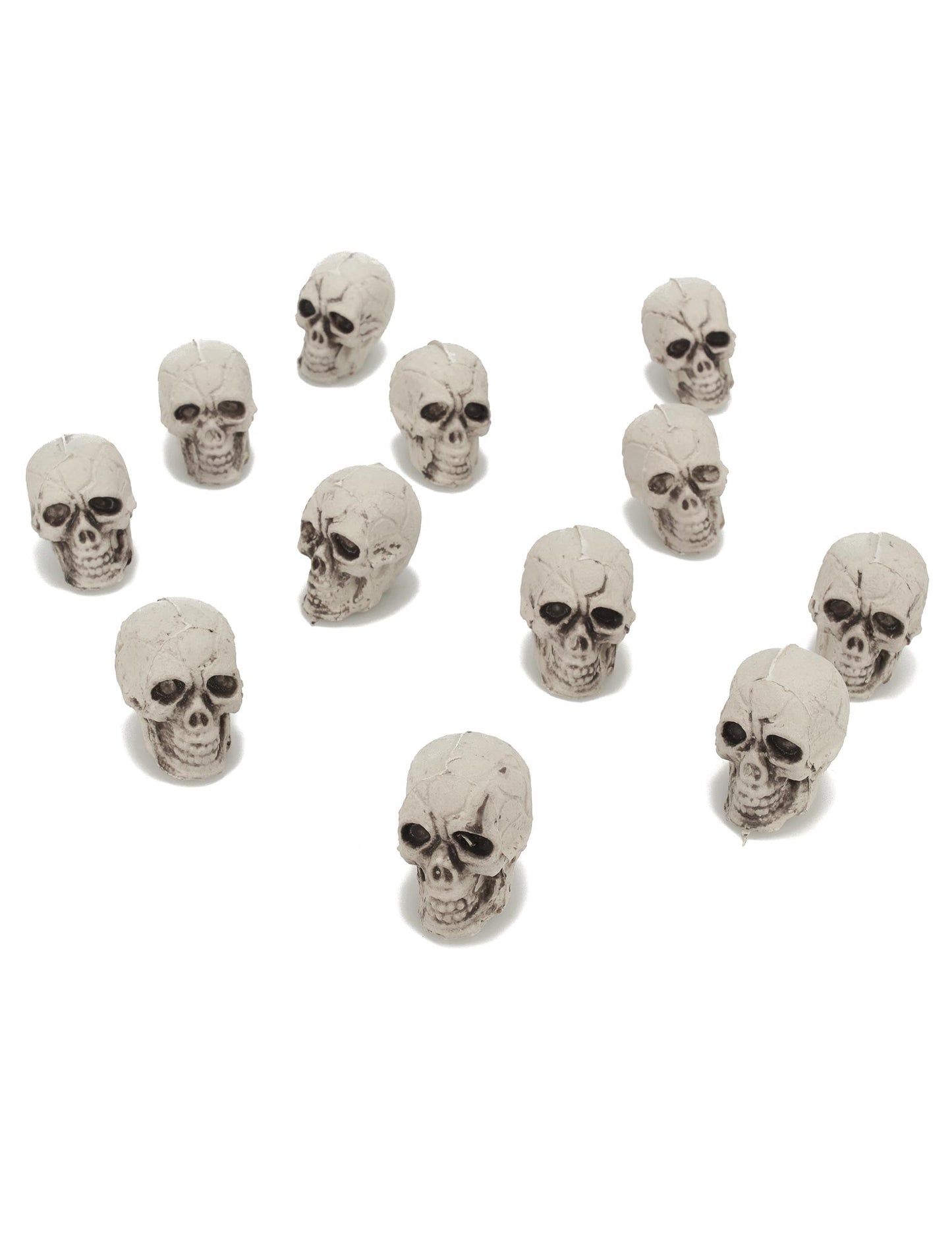 12 petites têtes de mort pour décoration en plastique blanc cassé