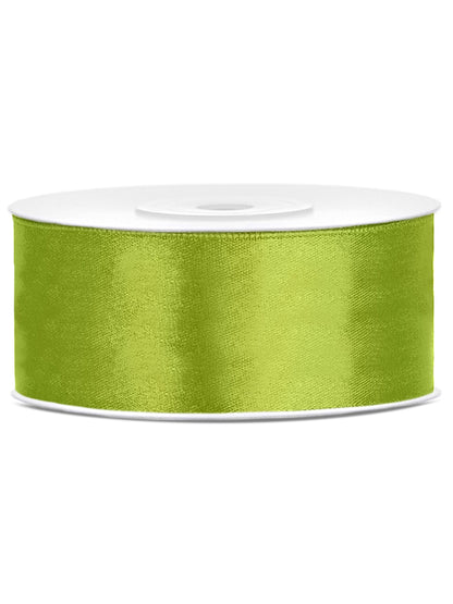 Nœud sur un paquet cadeau du ruban satin de fête pour décoration