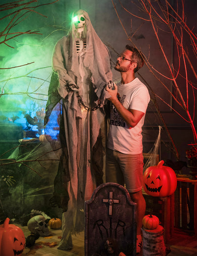 Squelette lumineux à suspendre Halloween gris avec œil vert